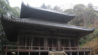 掛