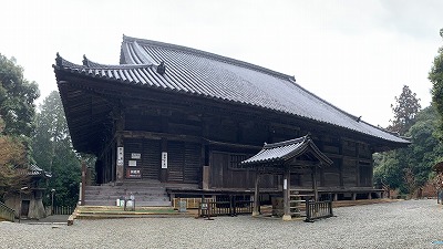 掛