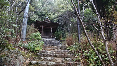 掛